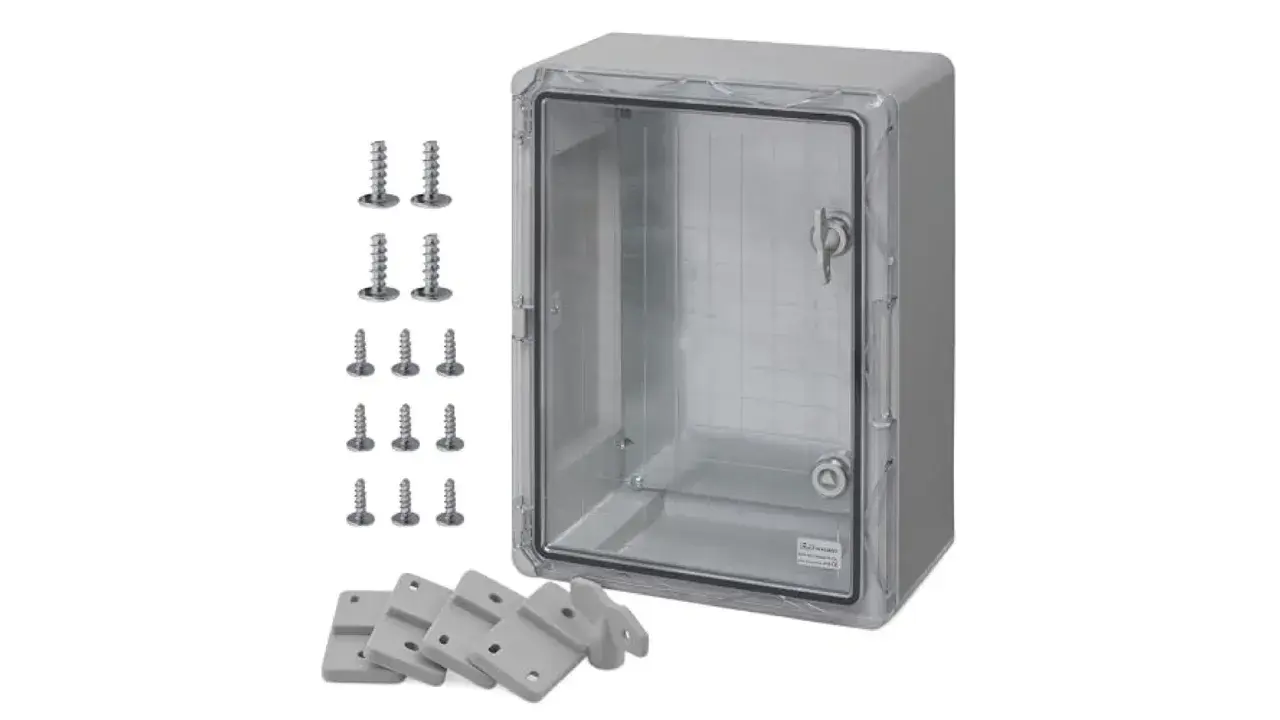 Coffret PVC transparent avec porte verrouillable, accompagné de vis et de supports de fixation. Idéal pour protéger vos équipements.