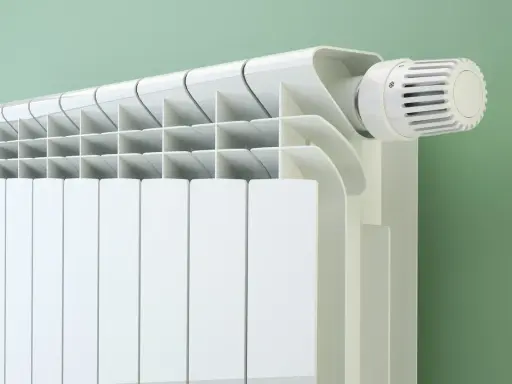 Radiateur blanc moderne avec thermostat. Question : peut on brancher 2 radiateurs sur la même ligne ?